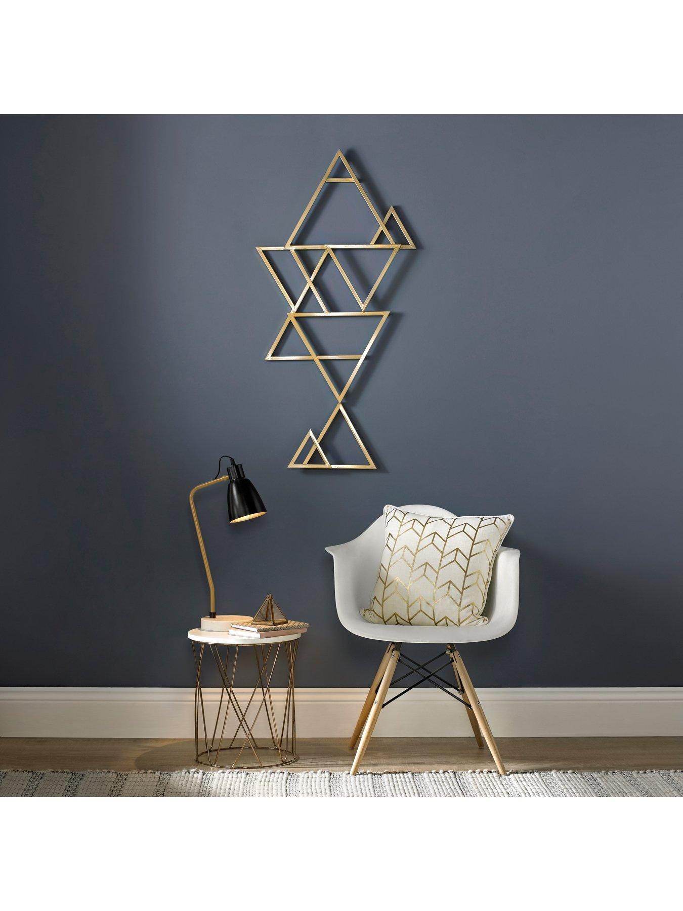 Gold abstract geo wall art - home accessories inspiration| Today we're talking inspiration for adding green to your living room. Green is a really versatile colour to decorate your home with. But, which colours and tones work well? What kind of accessories work with green? This post gives you ideas for pulling together an elegant green colour palette and pieces for your home. Read more: kittyandb.com #homeaccessories #geo #goldandwhite #wallart #interiordecoratinginspiration