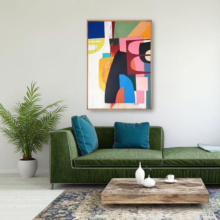 Green Sofa with Colourful Abstract Art Painting above. Green Home Decor Inspiration| Today we're talking inspiration for a green living room. Green is a really versatile colour to decorate your home with. But, which colours and tones work well? What kind of accessories work with green? This post gives you ideas for pulling together an elegant green colour palette and pieces for your home. Read more: kittyandb.com #greenlivingroom #greencolorpalette #wallart #greenaesthetic #abstractart