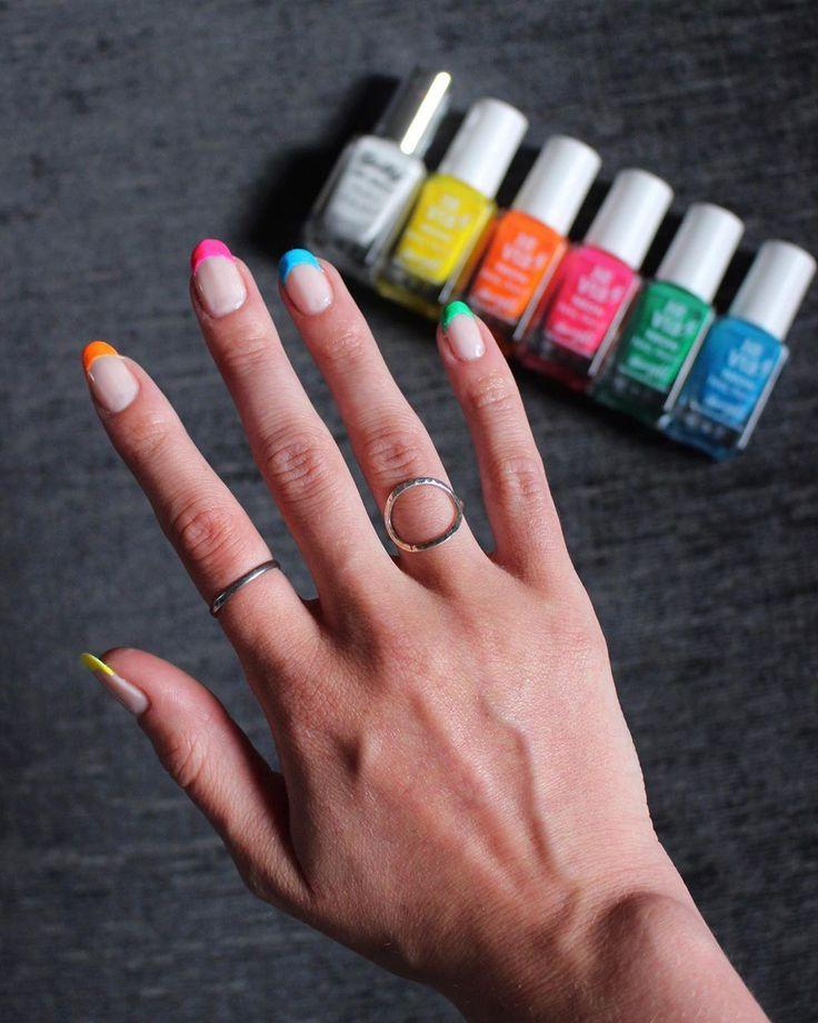 Neon Rainbow French Manicure Tip | We love a classic French manicure, it's elegant and timeless. But, we also love classic with a twist. Here are all the alternative French manicure styles you need | www.kittyandb.com #FrenchManicure #Nails #NailArt #French #Tip #Neon #Rainbow
