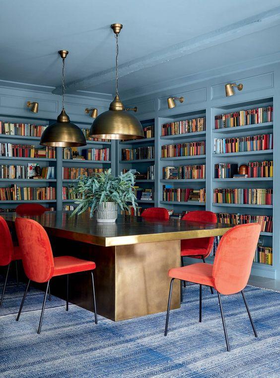 Colourful Blue, Gold and Red Dining Room Decor Inspiration| Blue is a really versatile colour to decorate your home with. But, which colours and tones work well? What kind of accessories work with blue? This post gives you ideas for pulling together an elegant blue colour palette and pieces for your home. Read more: kittyandb.com #blueroom #diningroom #red #colourfulhomedecor #bluecolorpalette #blueaesthetic