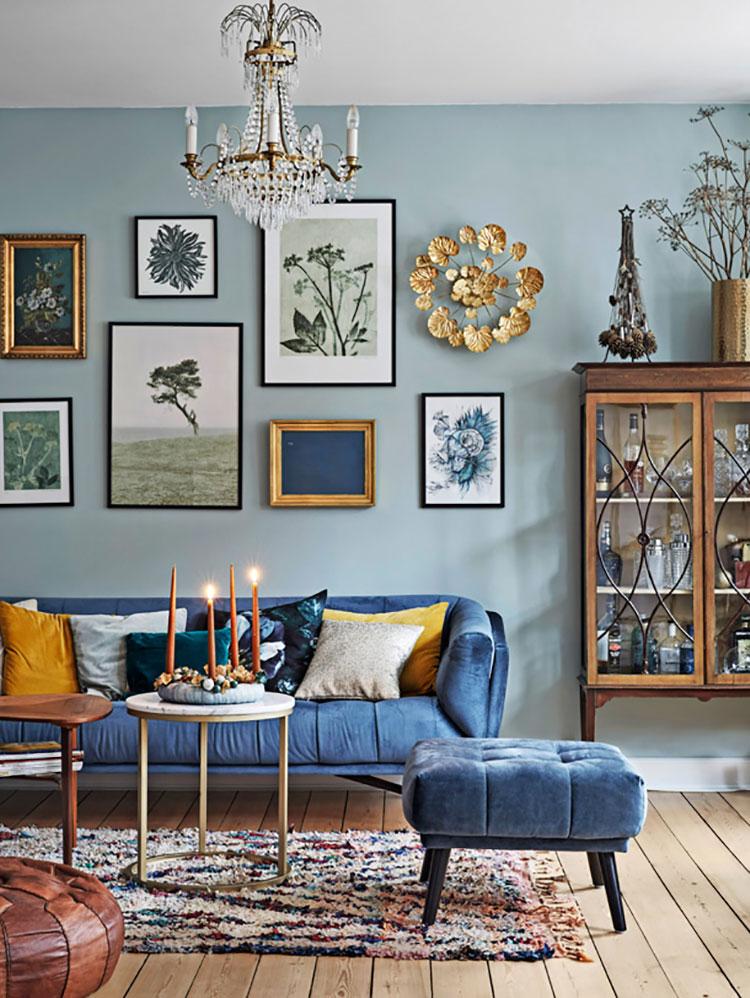 Blue Living Room with Gallery Wall Decor Inspiration| Blue is a really versatile colour to decorate your home with. But, which colours and tones work well? What kind of accessories work with blue? This post gives you ideas for pulling together an elegant blue colour palette and pieces for your home. Read more: kittyandb.com #blueroom #livingroom #GalleryWall #colourfulhomedecor #bluecolorpalette #blueaesthetic