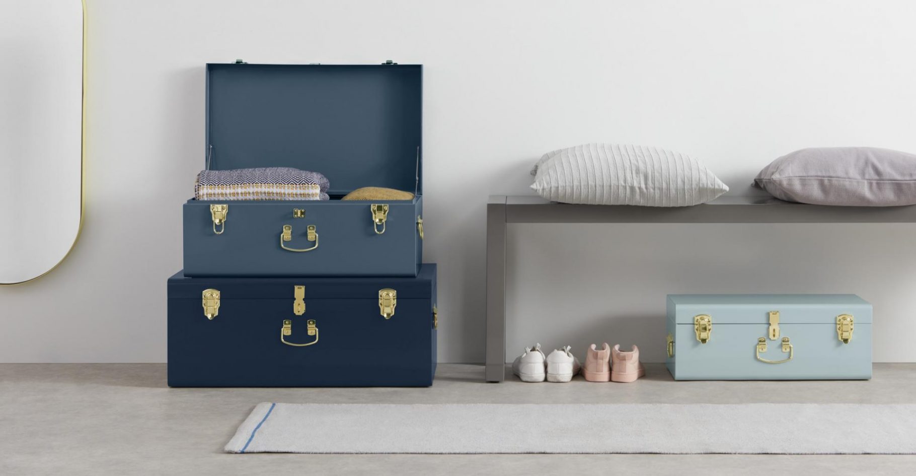 Tonal Blue Trunk Storage Living Room Decor Inspiration | Blue is a really versatile colour to decorate your home with. But, which colours and tones work well? What kind of accessories work with blue? This post gives you ideas for pulling together an elegant, calming blue colour palette and pieces for your home. Read more: kittyandb.com #Blue #colourfulhomedecor #interiordecoratinginspiration #storage