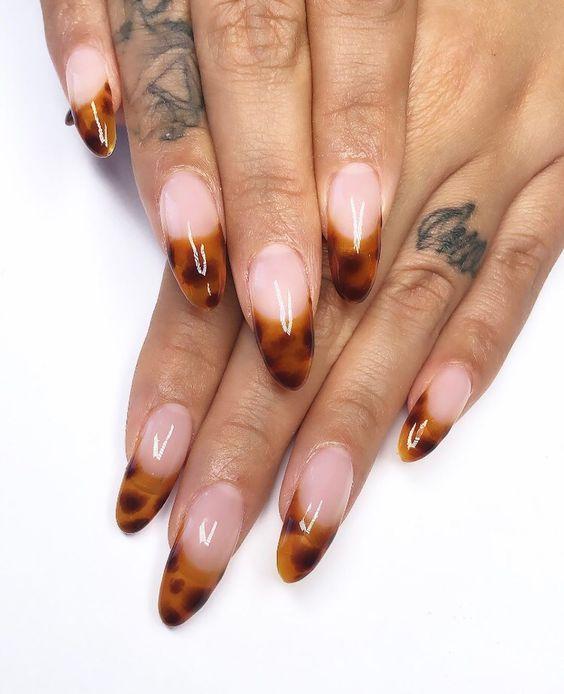 Animal Print French Manicure Tips | We love a classic French manicure, it's elegant and timeless. But, we also love classic with a twist. Here are all the alternative French manicure styles you need | www.kittyandb.com #Animal Print #AnimalPrintNails #NailArt #French #Tip #FrenchManicure #Nails