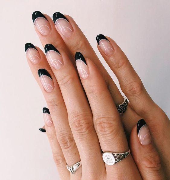 Black and White French Manicure Tips | We love a classic French manicure, it's elegant and timeless. But, we also love classic with a twist. Here are all the alternative French manicure styles you need | www.kittyandb.com #BlackNails #NailArt #French #Tip #Black #BlackAesthetic