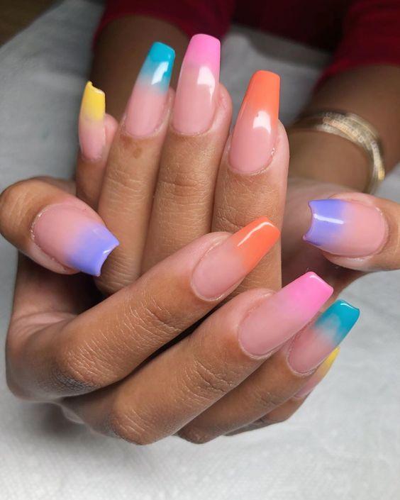 Pastel Ombre Rainbow French Manicure Tip | We love a classic French manicure, it's elegant and timeless. But, we also love classic with a twist. Here are all the alternative French manicure styles you need | www.kittyandb.com #FrenchManicure #Nails #NailArt #French #Tip #Ombre #Rainbow