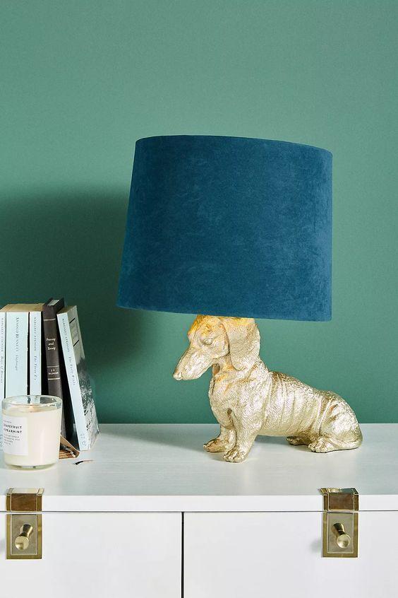 Blue Dachshund Lamp Room Decor Inspiration| Blue is a really versatile colour to decorate your home with. But, which colours and tones work well? What kind of accessories work with blue? This post gives you ideas for pulling together an elegant blue colour palette and pieces for your home. Read more: kittyandb.com #blueroom #colourfulhomedecor #Lighting #bluecolorpalette #blueaesthetic #Dachshund