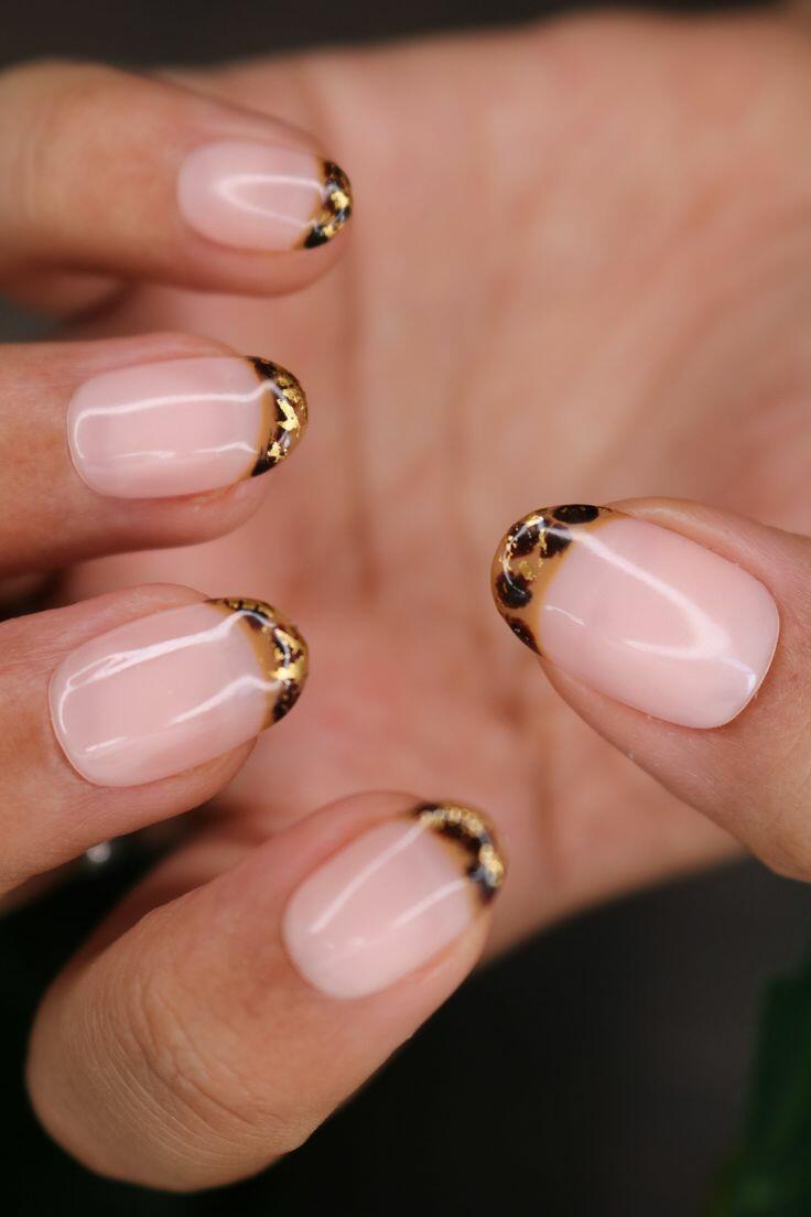 Stick On Animal Print French Tip Nails | We love a classic French manicure, it's elegant and timeless. But, we also love classic with a twist. Here are all the alternative French manicure styles you need | www.kittyandb.com #StickOnNails #AnimalPrint #BrownNails #NailArt #French #Tip #FrenchManicure #Nails #NeutralNails